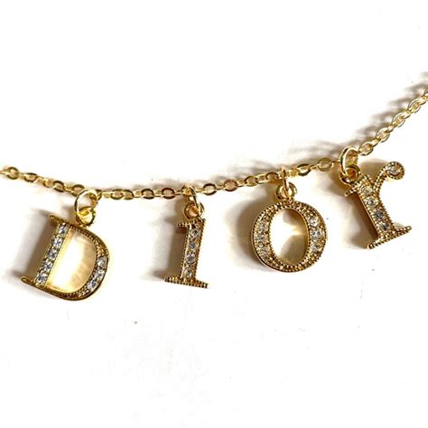 dior writing necklace|Dior spellout necklace.